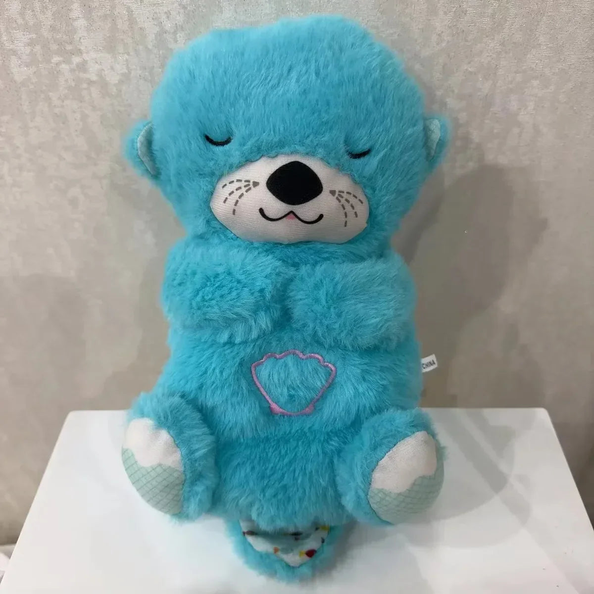 Peluche loutre apaisante